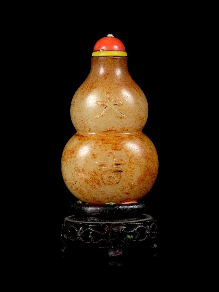 Appraisal: A Russet and Celadon Jade Double-Gourd Form Snuff Bottle Height