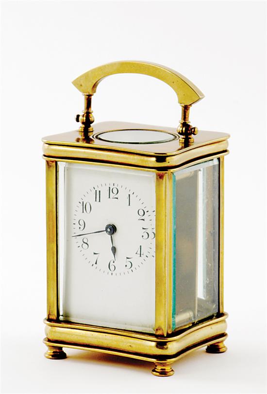 Appraisal: French brass carriage clock circa brass-bound beveled glass case encasing