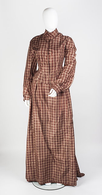 Appraisal: A late Victorian brown jacket and skirt of checked design