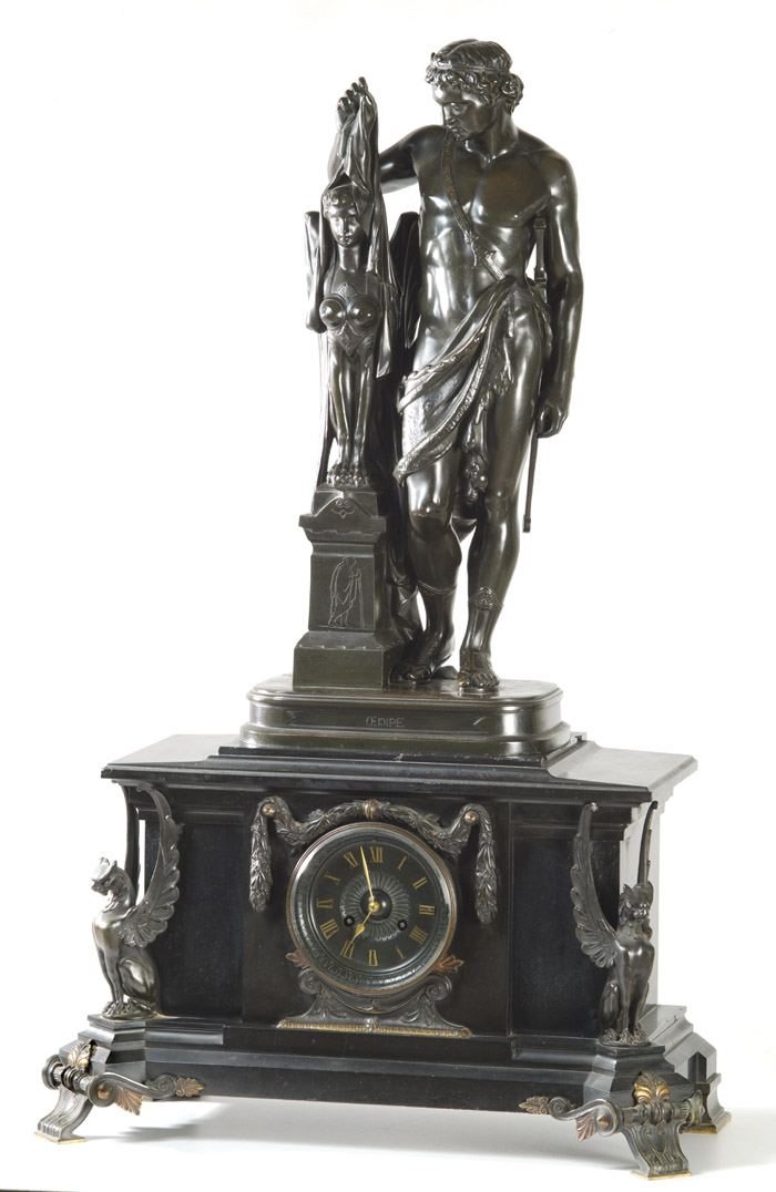 Appraisal: FRENCH BRONZE AND BLACK MARBLE STATUE CLOCK the black marble