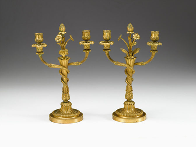 Appraisal: Pair of Continental neoclassical style gilt-bronze candlesticks circa The beaded