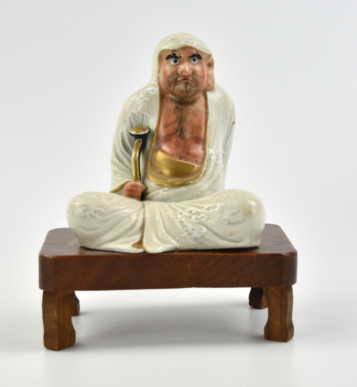 Appraisal: Japanese Taisho Peeriod a male figure seated on a wooden