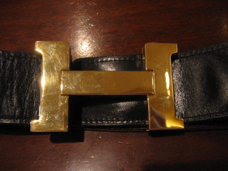 Appraisal: HERMES FRANCE Gold H belt buckle with black leather belt