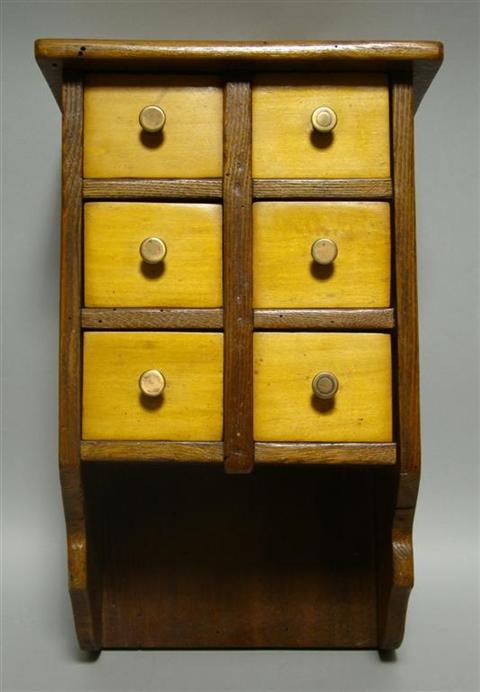 Appraisal: AMERICAN HANGING SPICE CABINET with six small drawers with recessed