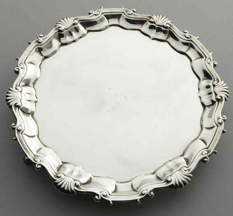 Appraisal: George III sterling silver waiter by Hugh Millswith a shell