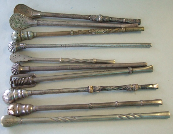 Appraisal: A quantity of Mate spoons some with silver and brass