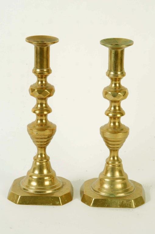 Appraisal: A pair of brass beehive candlesticks th century PROVENANCE The