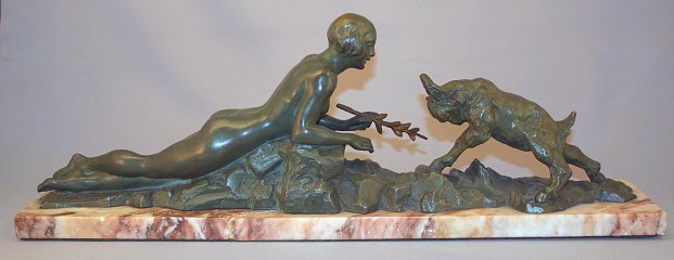 Appraisal: NUDE FIGURAL GROUPING WITH RECLINING FEMALE YOUNG GOAT Patinated metal