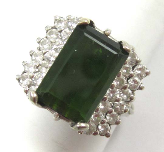 Appraisal: GREEN TOURMALINE AND DIAMOND RING k white gold featuring an