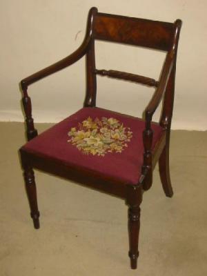 Appraisal: A GEORGE III MAHOGANY ELBOW CHAIR of Sheraton type scroll