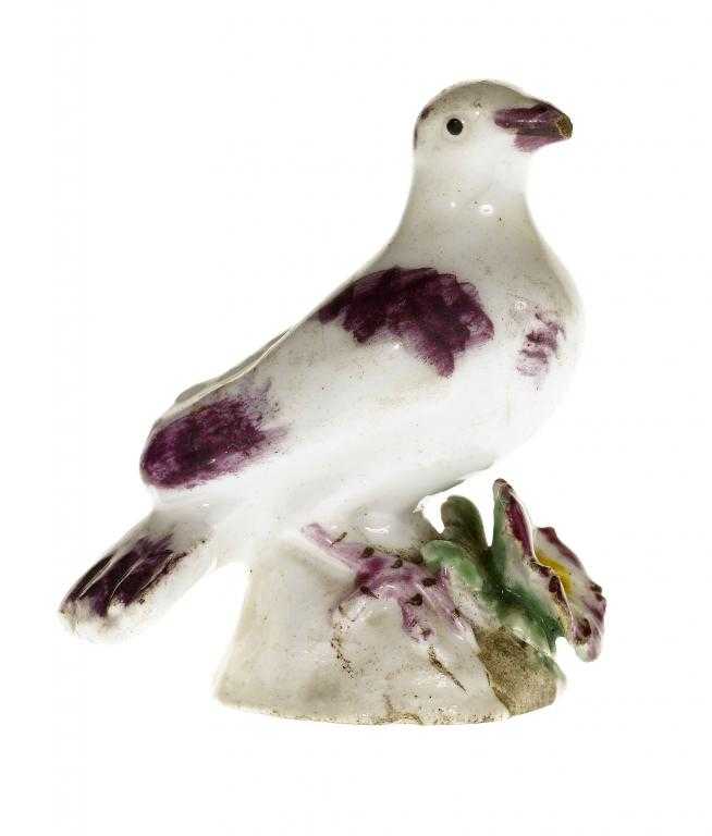 Appraisal: A BOW TOY MODEL OF A PIGEON with purple markings