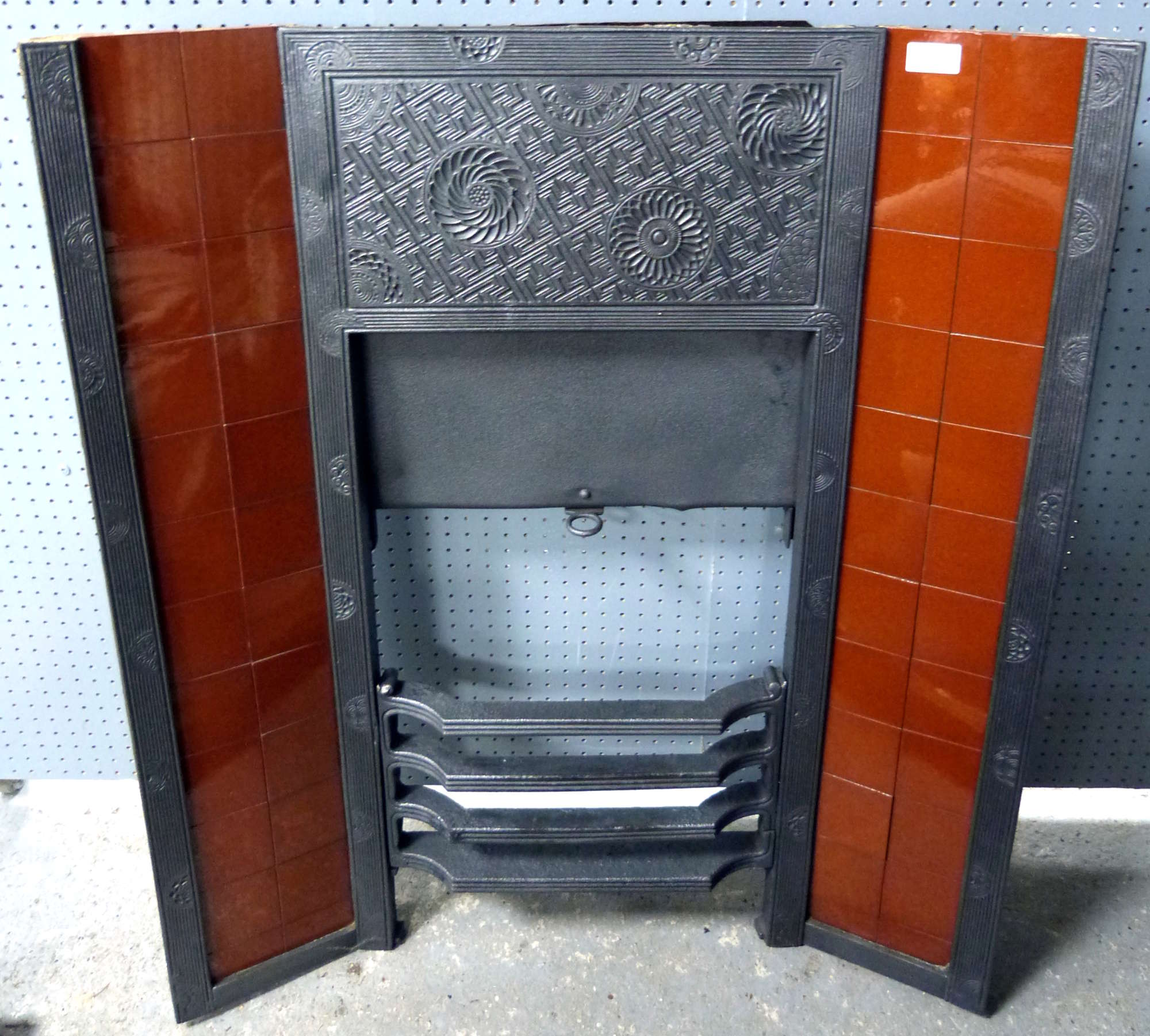 Appraisal: Thomas Jeckyll An Aesthetic Movement cast iron fireplace probably manufactured