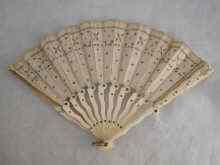 Appraisal: A th century ivory folding handbag fan the silk with