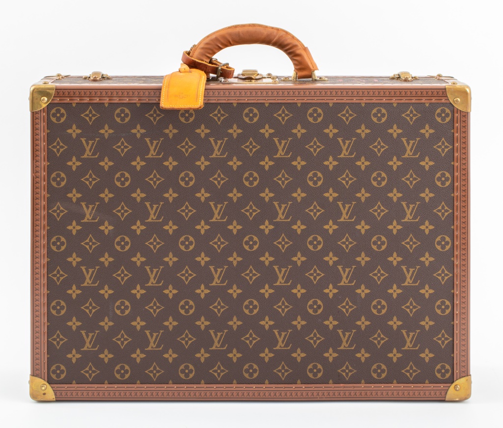 Appraisal: LOUIS VUITTON HARD SIDED LEATHER SUITCASE Vintage Louis Vuitton hard