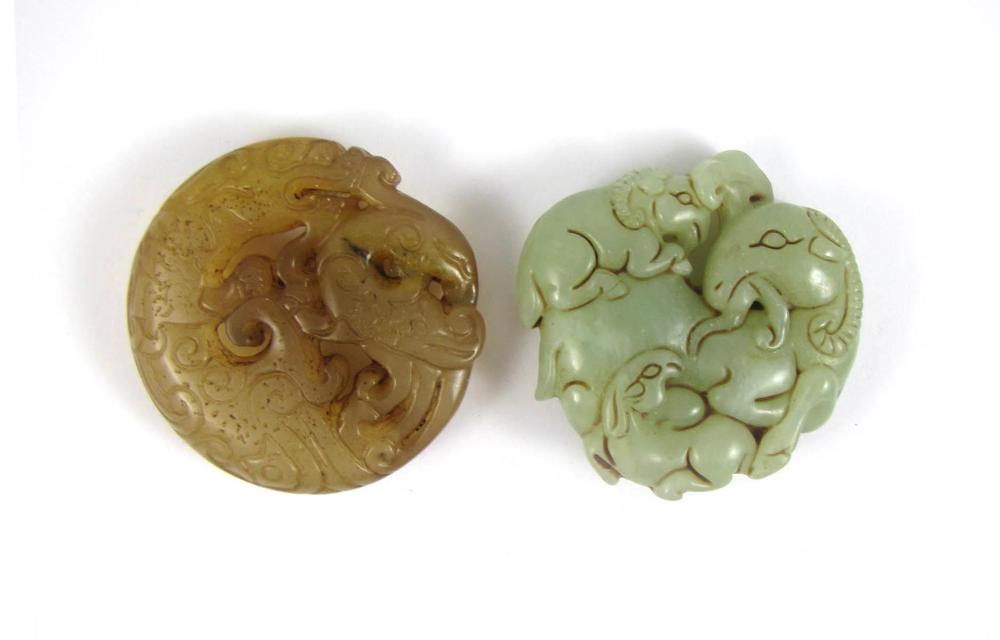 Appraisal: TWO CHINESE DOUBLE SIDED HARDSTONE CARVINGS including an opaque light