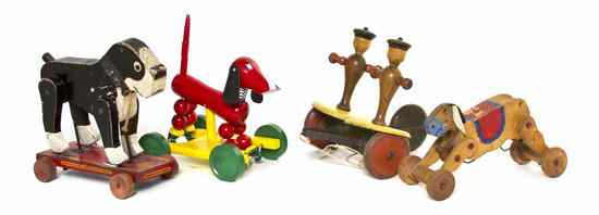 Appraisal: A Collection of Three Wood Pull Toys comprising a Swedish