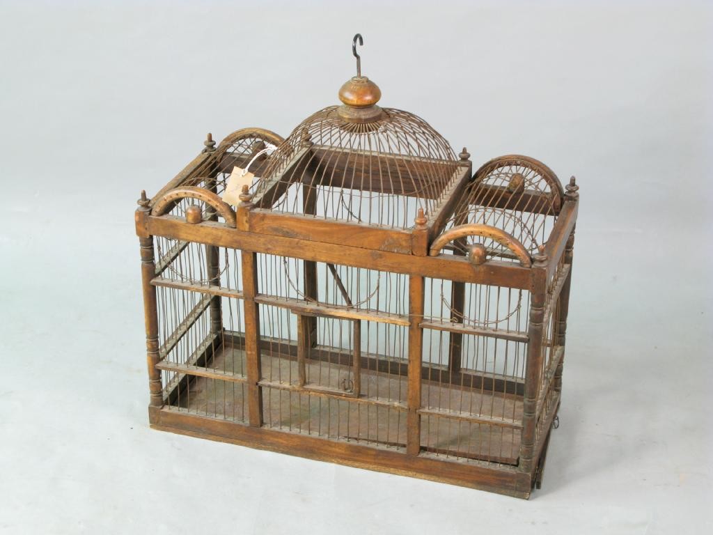 Appraisal: A Victorian birdcage domed stained wood frame with iron wire-work