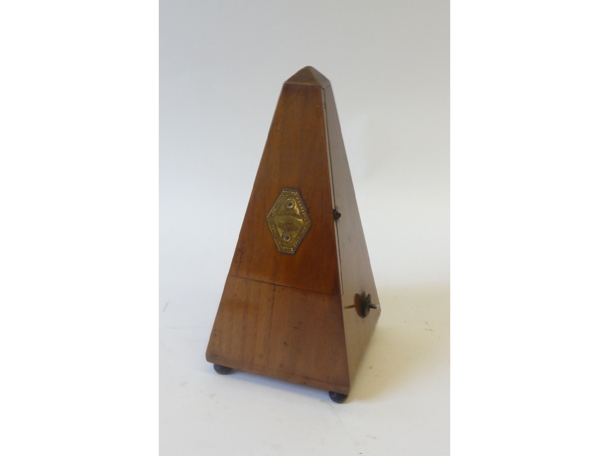 Appraisal: A MAELZEL METRONOME in walnut case