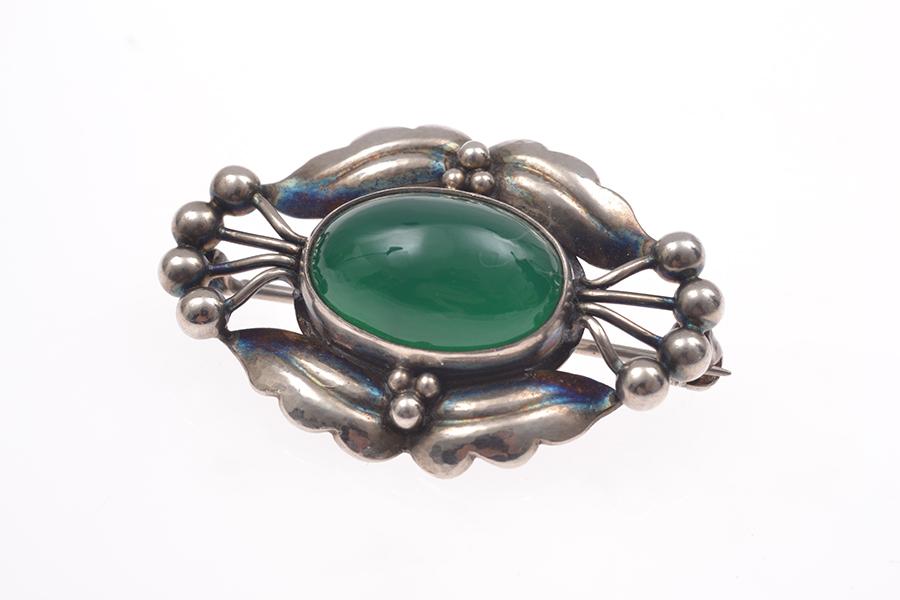 Appraisal: A GREEN STONE BROOCH BY GEORG JENSEN IN STERLING SILVER