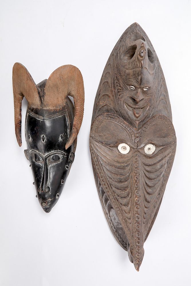 Appraisal: African PNG Tribal Masks African PNG Tribal Masks carved wood