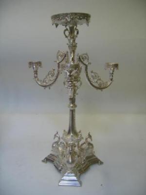 Appraisal: AN EPERGNE c with central circular bowl support on scroll