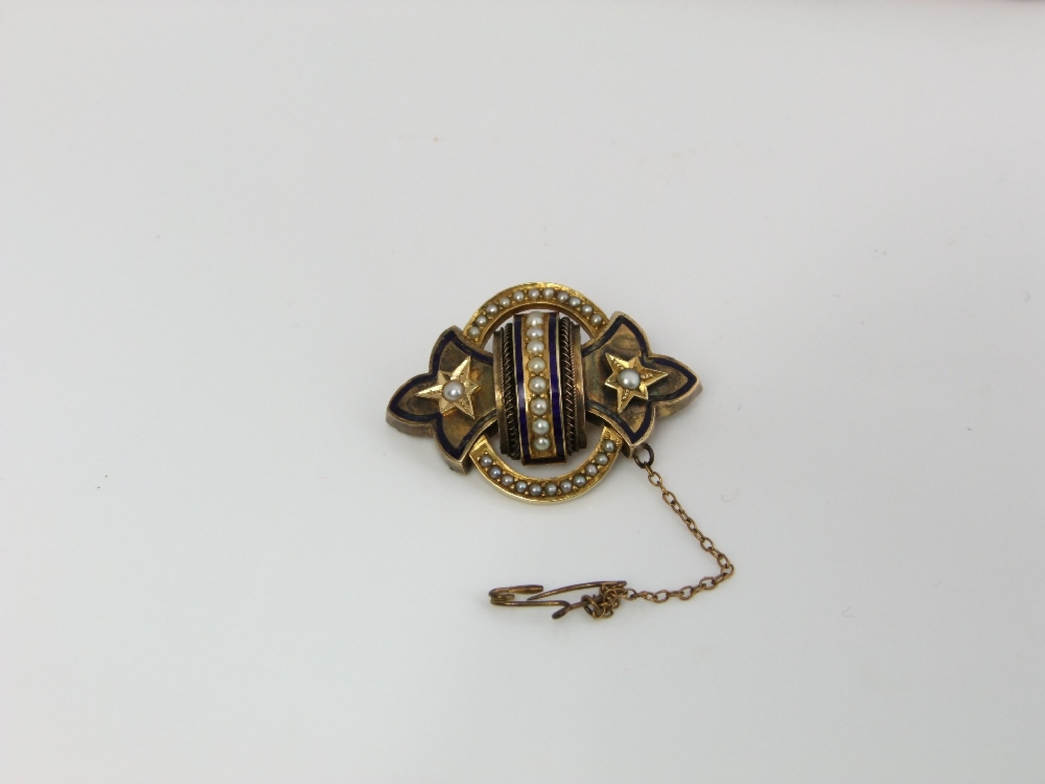 Appraisal: A Victorian brooch enamel and seed pearl set