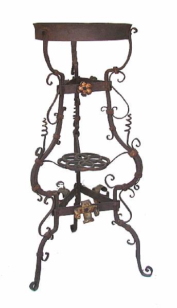 Appraisal: A Victorian wrought metal jardiniere stand height in