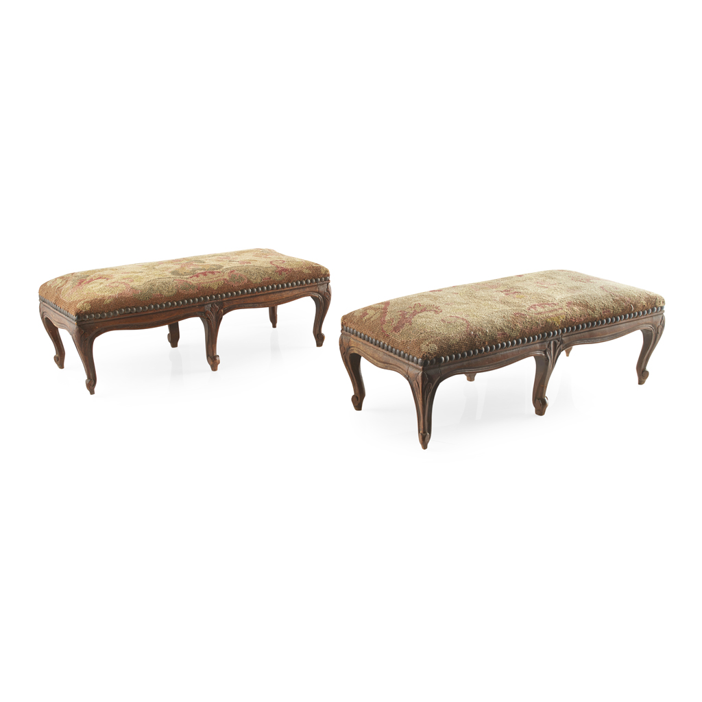 Appraisal: PAIR OF BEECH NEEDLEWORK UPHOLSTERED FOOTSTOOLS TH CENTURY the rectangular