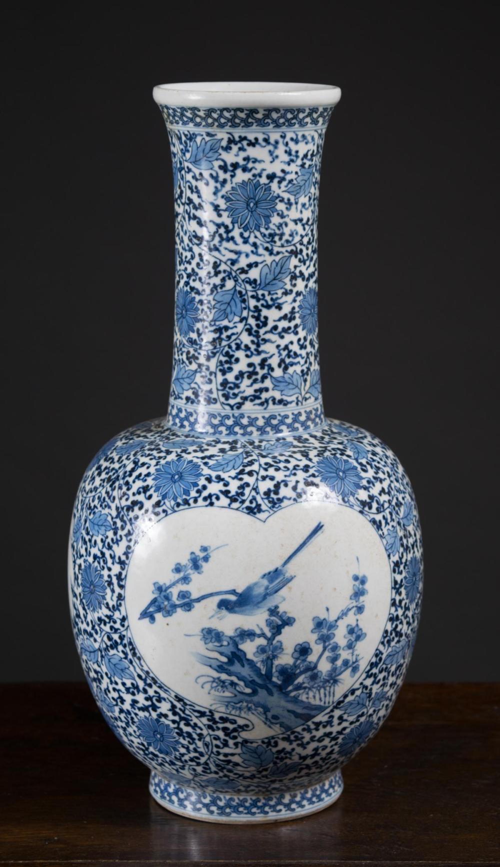 Appraisal: CHINESE BLUE AND WHITE PORCELAIN VASE of bottle form hand