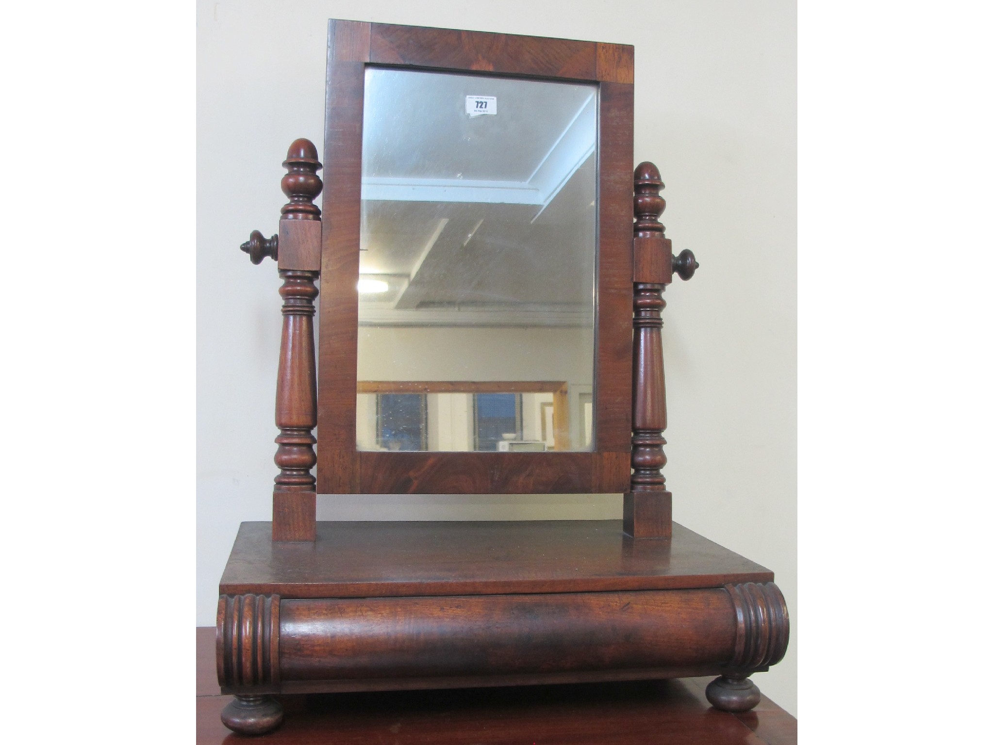 Appraisal: A Victorian mahogany dressing mirror with drawer