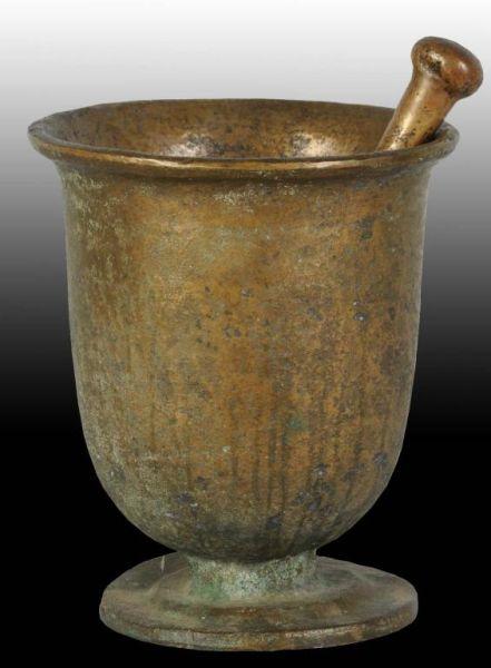 Appraisal: Brass Mortar Pestle Description Early and crudely cast with general