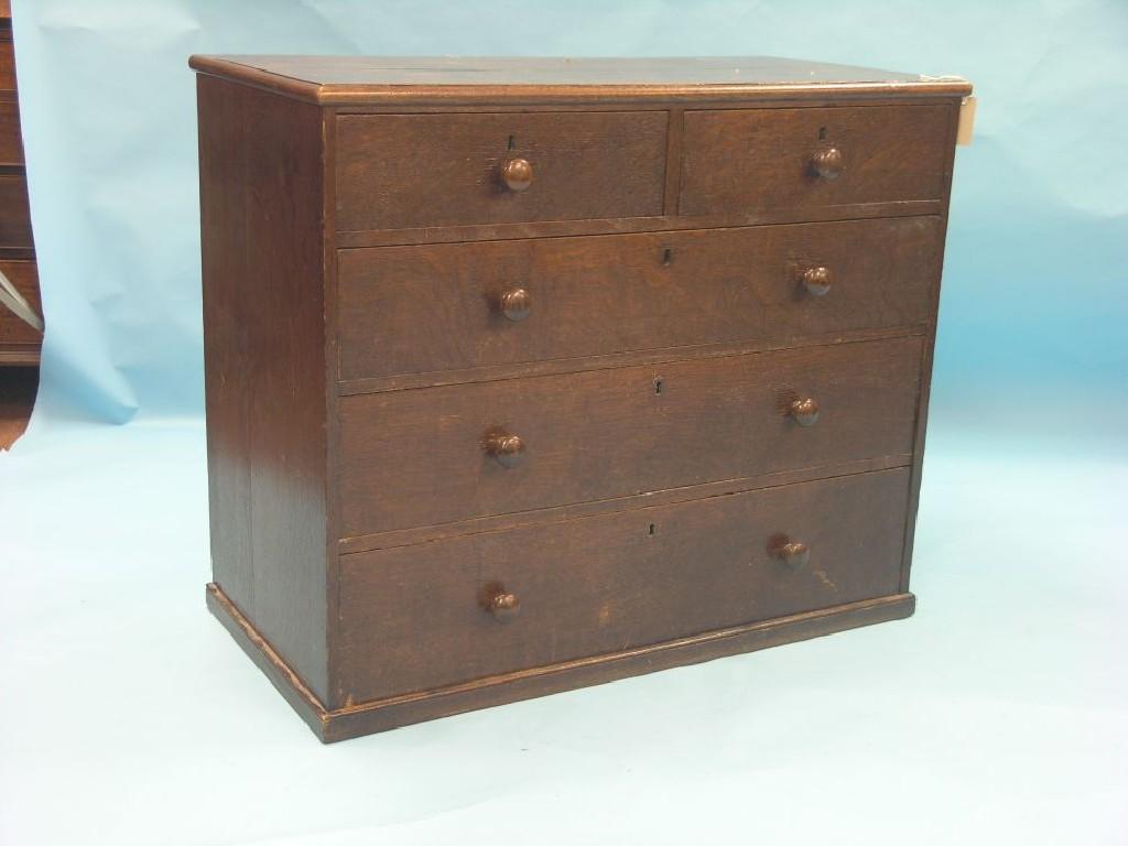 Appraisal: A Victorian oak chest two short and three long drawers