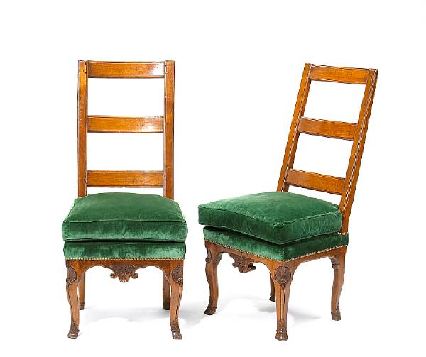 Appraisal: A pair of R gence walnut chairs mid th century