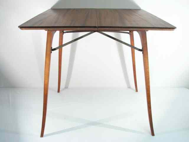 Appraisal: A wooden folding side card table with a mahogany finish