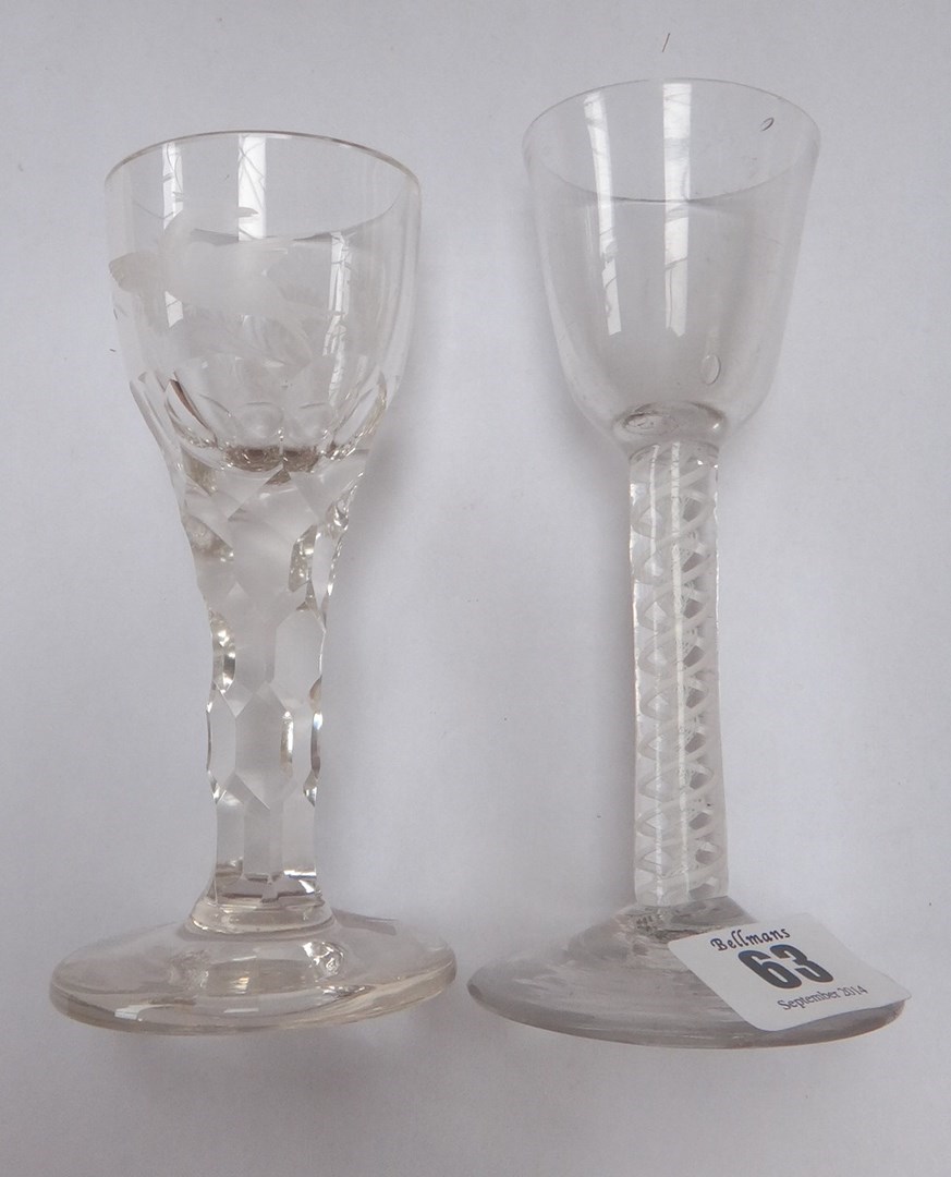 Appraisal: An opaque twist wine glass circa the rounded funnel bowl