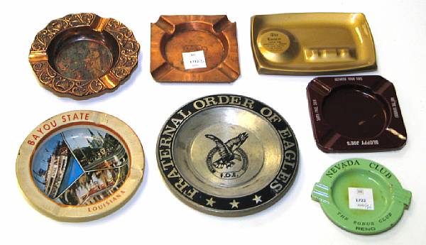 Appraisal: Metal ashtrays A grouping of advertising-themed ashtrays from the mid-