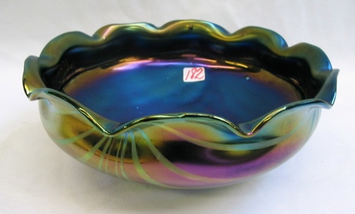 Appraisal: A LOETZ STYLE IRIDESCENT ART GLASS BOWL deep blue iridescent