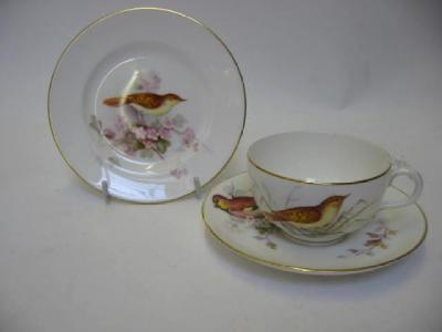 Appraisal: A ROYAL WORCESTER PORCELAIN TRIO painted by W Powell with