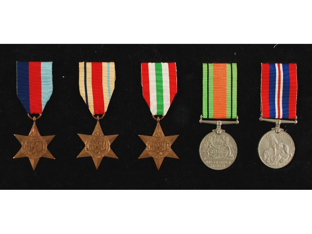 Appraisal: FIVE WORLD WAR II SERVICE MEDALS WITH RIBBONS ON A