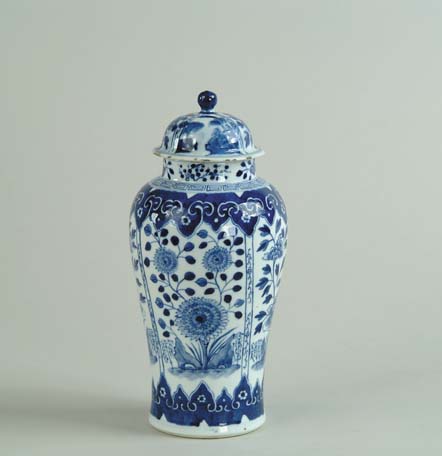 Appraisal: BLUE AND WHITE COVERED CHINESE VASE Four panel blue decoration