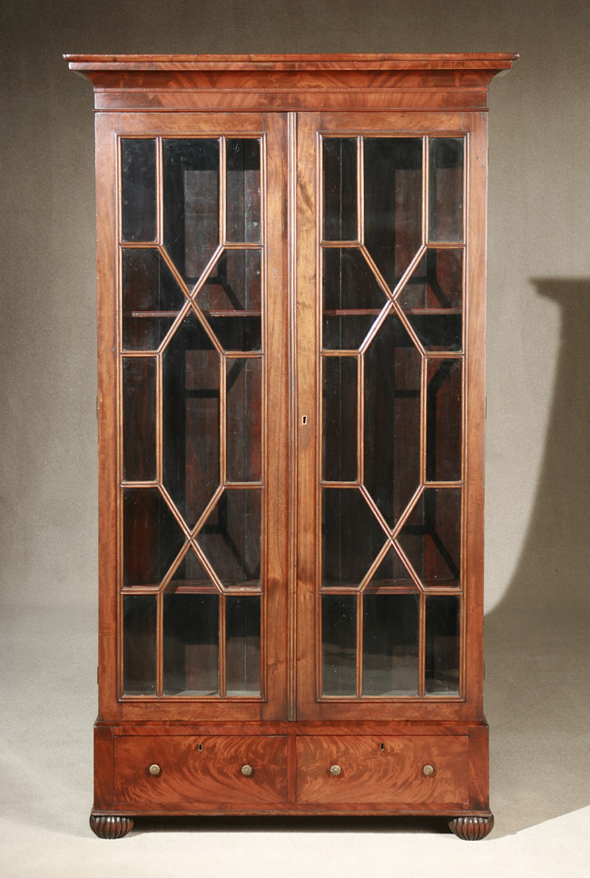 Appraisal: Regency Mahogany Bookcase Early th Century The removable cornice above