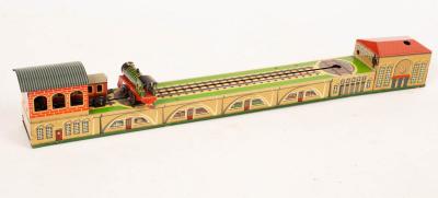 Appraisal: A push pull clockwork train and carriage with cm track