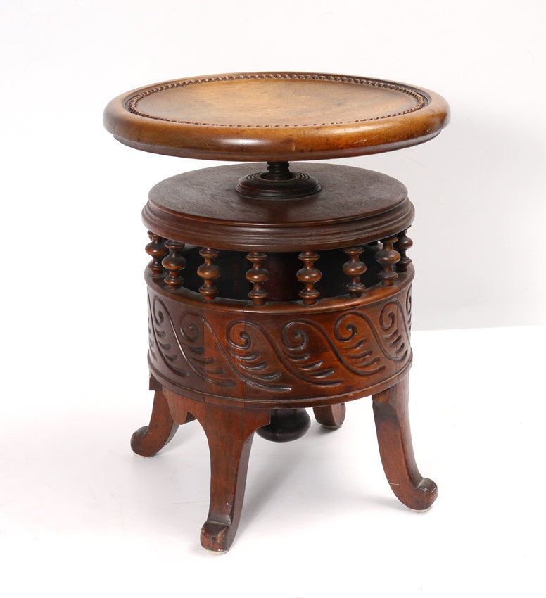 Appraisal: NORWEGIAN CARVED PIANO STOOL Seat rotates and rises carved skirt