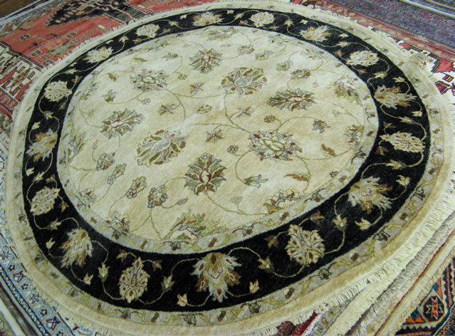 Appraisal: ROUND PAKISTANI-PERSIAN AREA RUG ' diameter