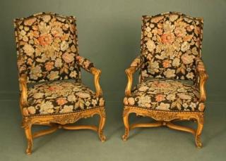 Appraisal: PAIR OF LOUIS XV STYLE PROVINCIAL CARVED FRUITWOOD FAUTEUILS PAIR