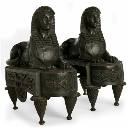 Appraisal: A pair of th century sphinx chenets each facing forward