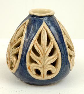 Appraisal: MARGUERITE MAHOOD Victoria Circa Baluster earthenware reticulated vase foliate pierced