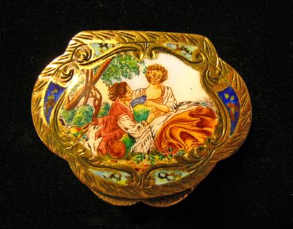 Appraisal: Gold plate enamel pill boxHeavily engraved and lid displays pastoral