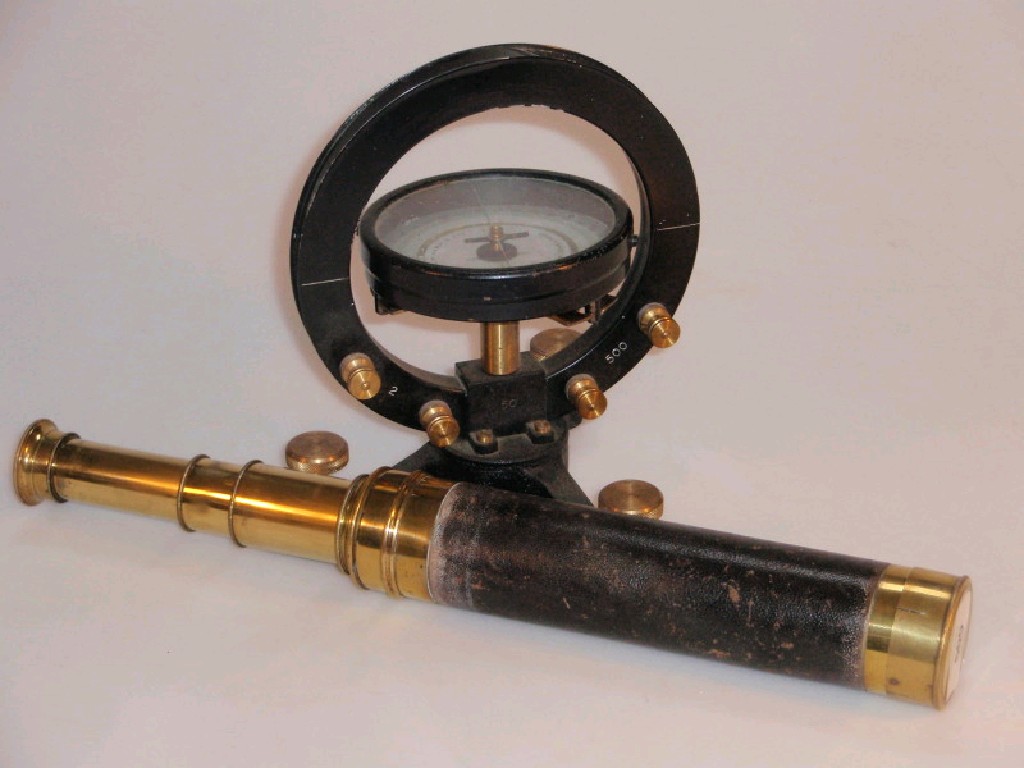 Appraisal: A four draw brass telescope with leather sleeves together with