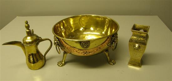 Appraisal: Brass and copper bowl with lion's head handles and two